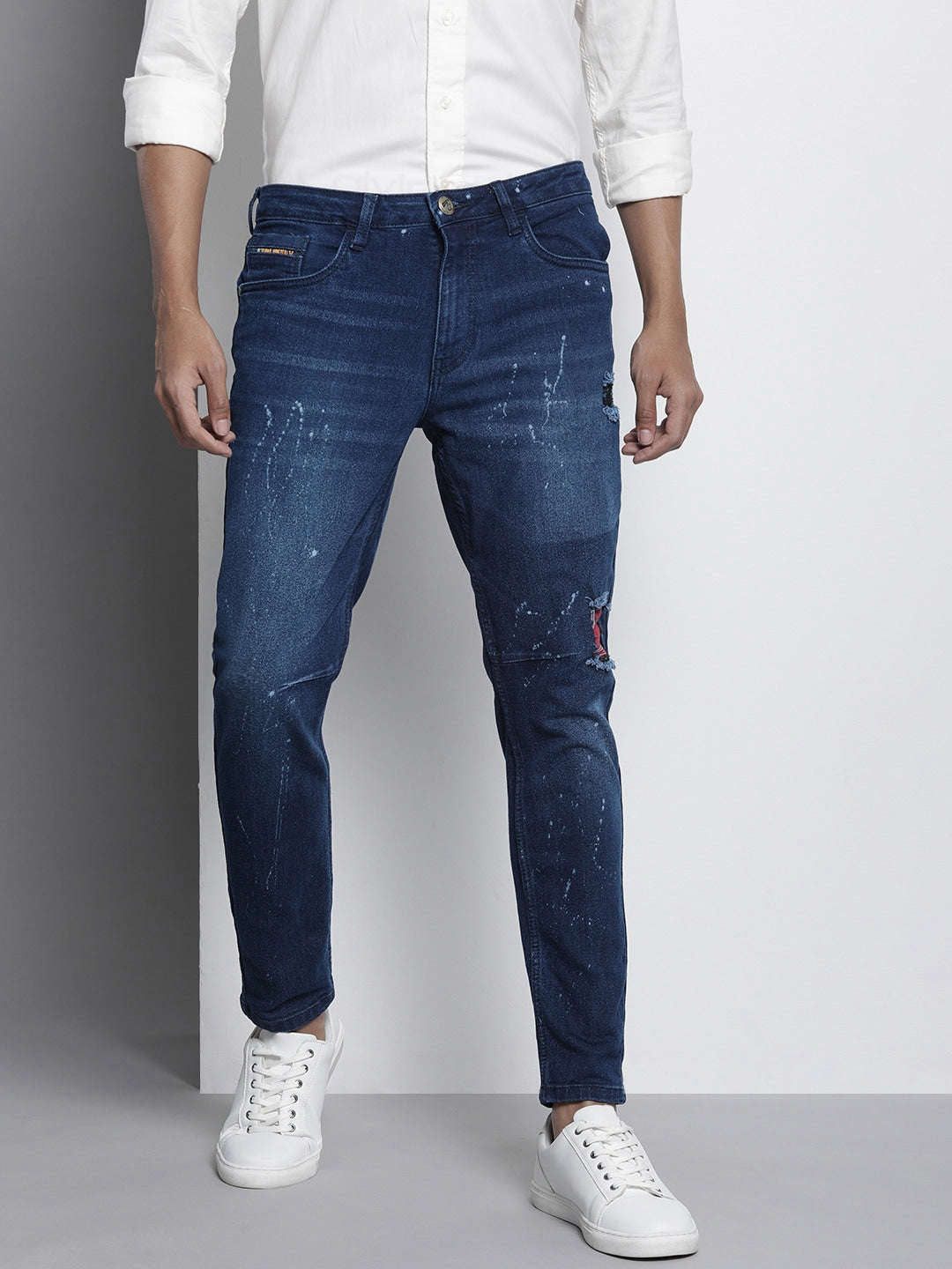 Shop Men Distress Carrot Fit Jeans Online.