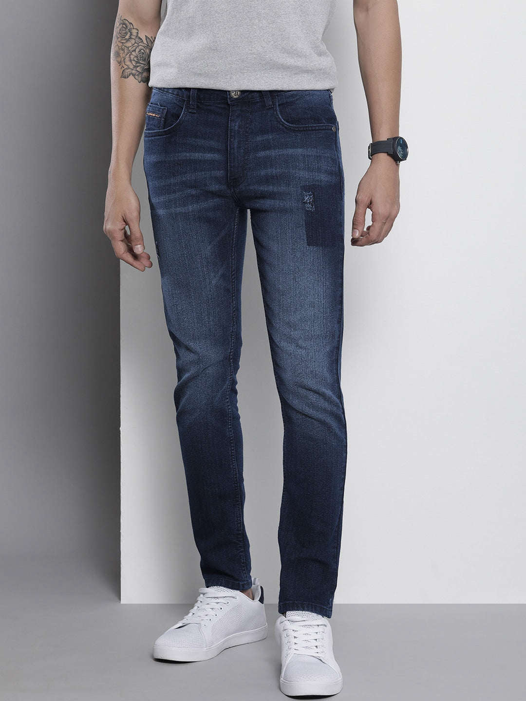 Shop Men Distress Skinny Fit Jeans Online.