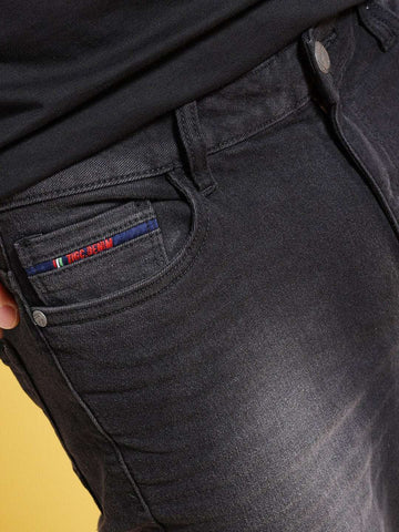 Shop The Indian Garage Co Men Bootcut Clean Look Mid-Rise Stretchable Jeans Online.