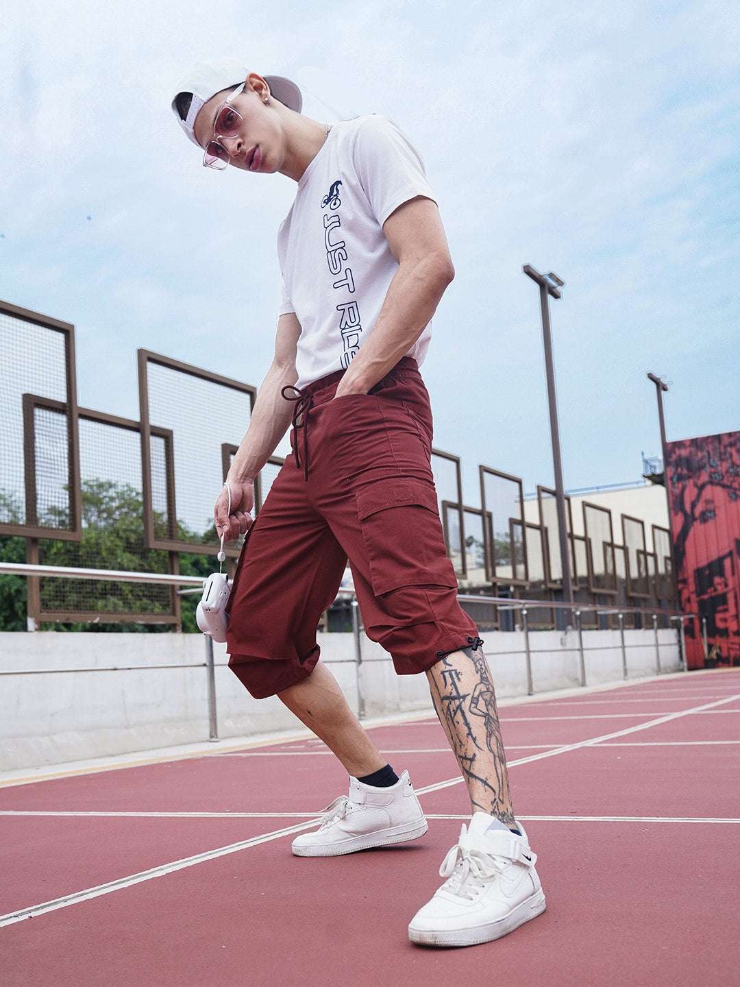 Shop Men Cargo Parachute Bermuda Shorts Online.