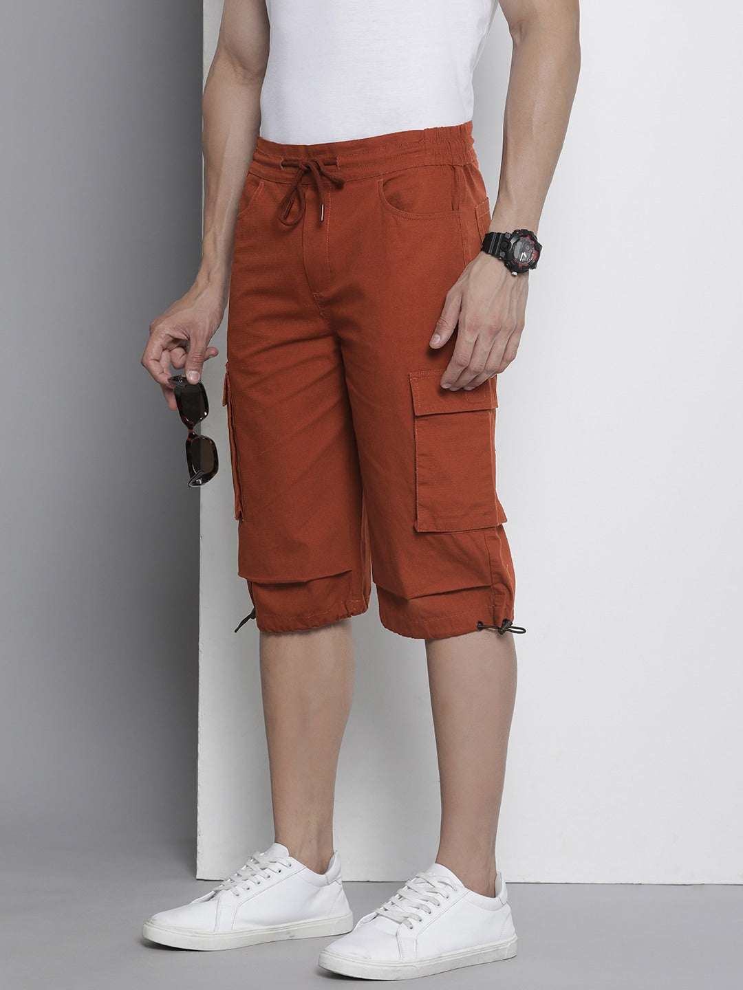 Shop Men Cargo Parachute Bermuda Shorts Online.