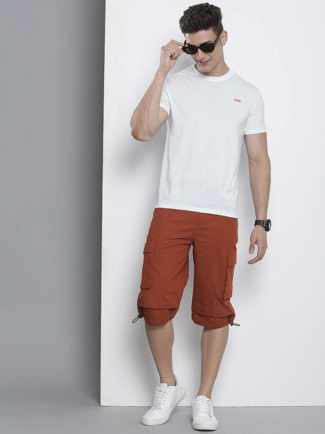 Shop Men Cargo Parachute Bermuda Shorts Online.