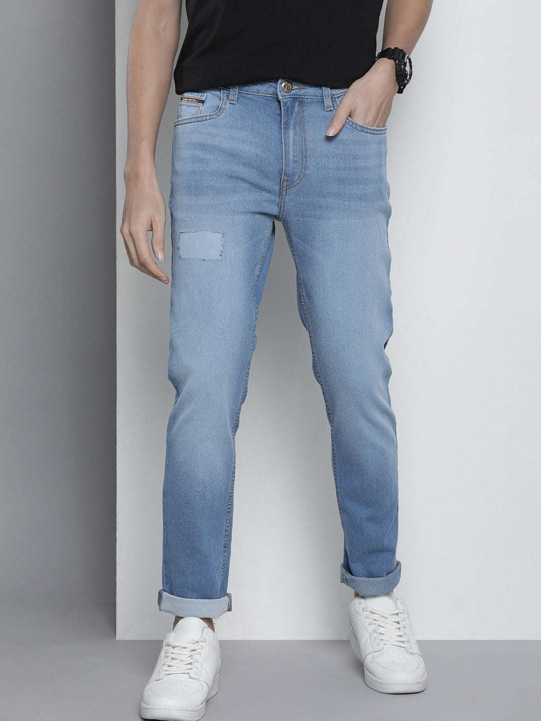 Shop Men Distressed Slim-Fit Jeans Online.