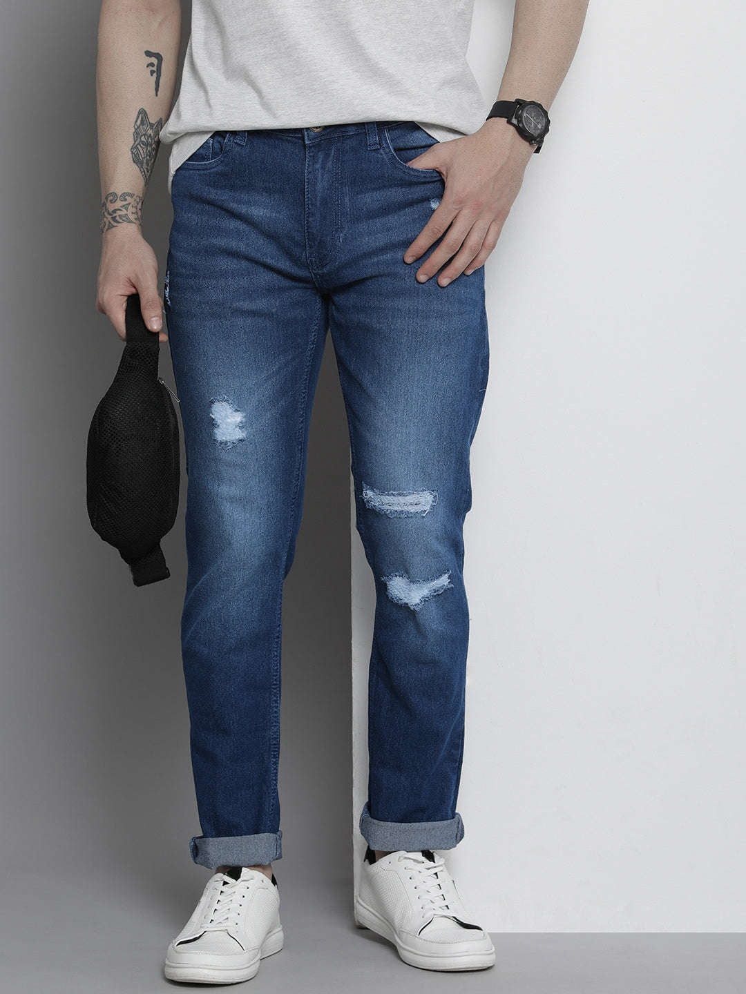 Shop Men Distressed Slim Jeans Online.