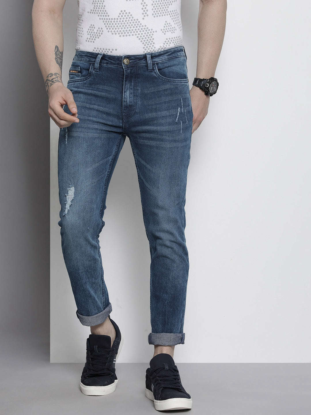 Shop Men Distress Slim Fit Jeans Online.