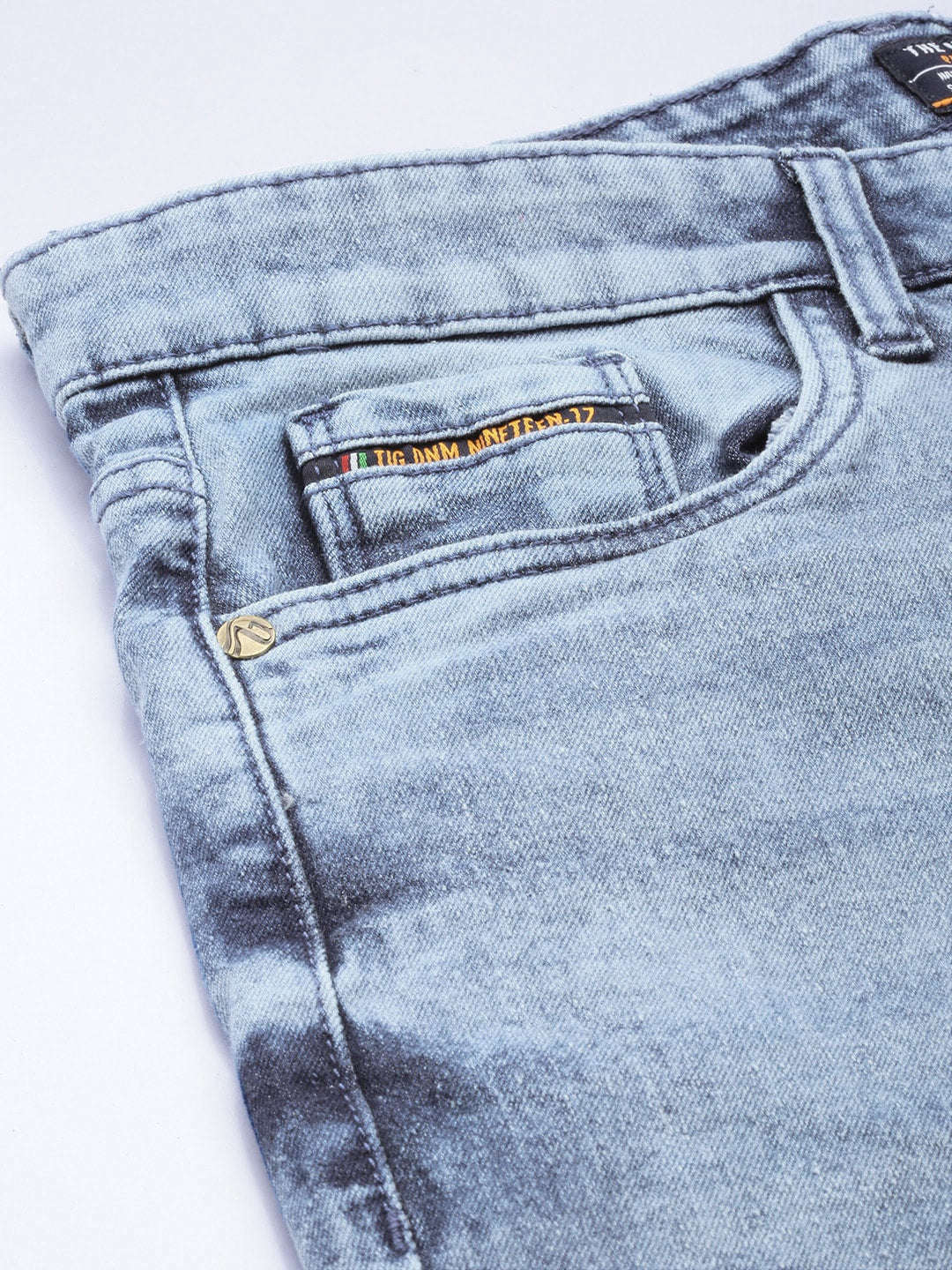 Shop Men Solid Slim Fit Denim Online.