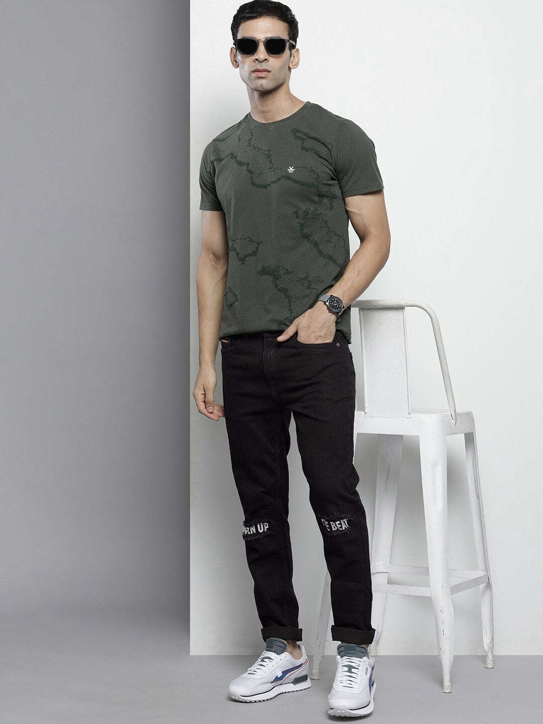 Shop Men Placement Printed Jeans Online.