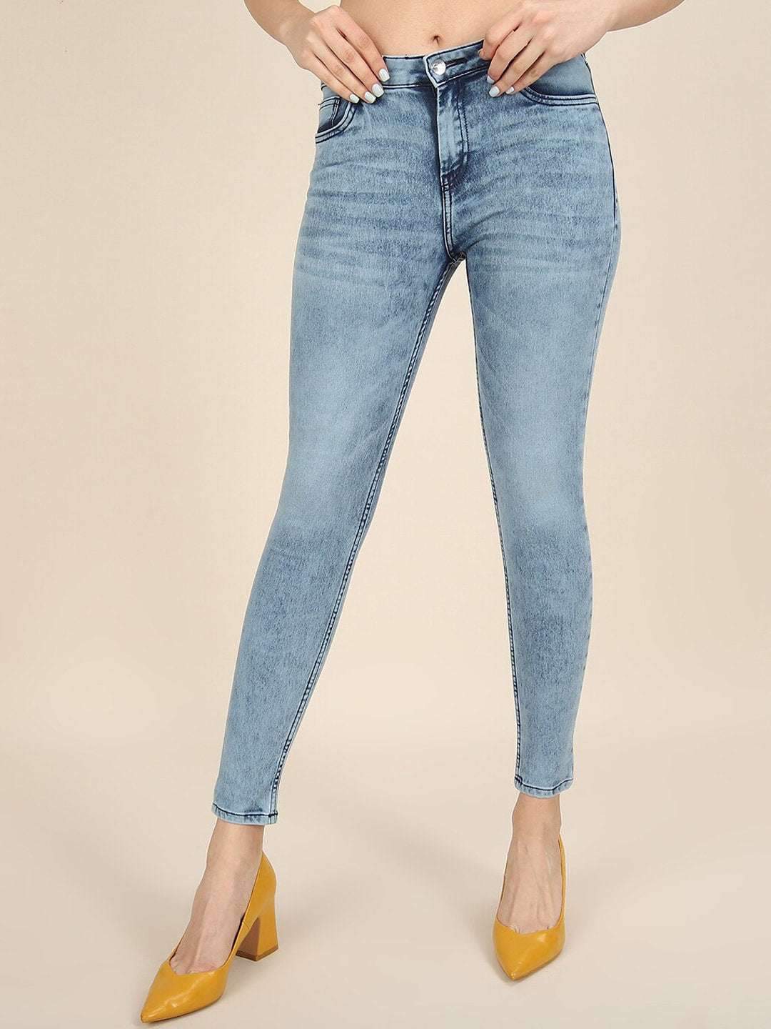 Shop Women Distressed Slim-Fit Jeans Online.