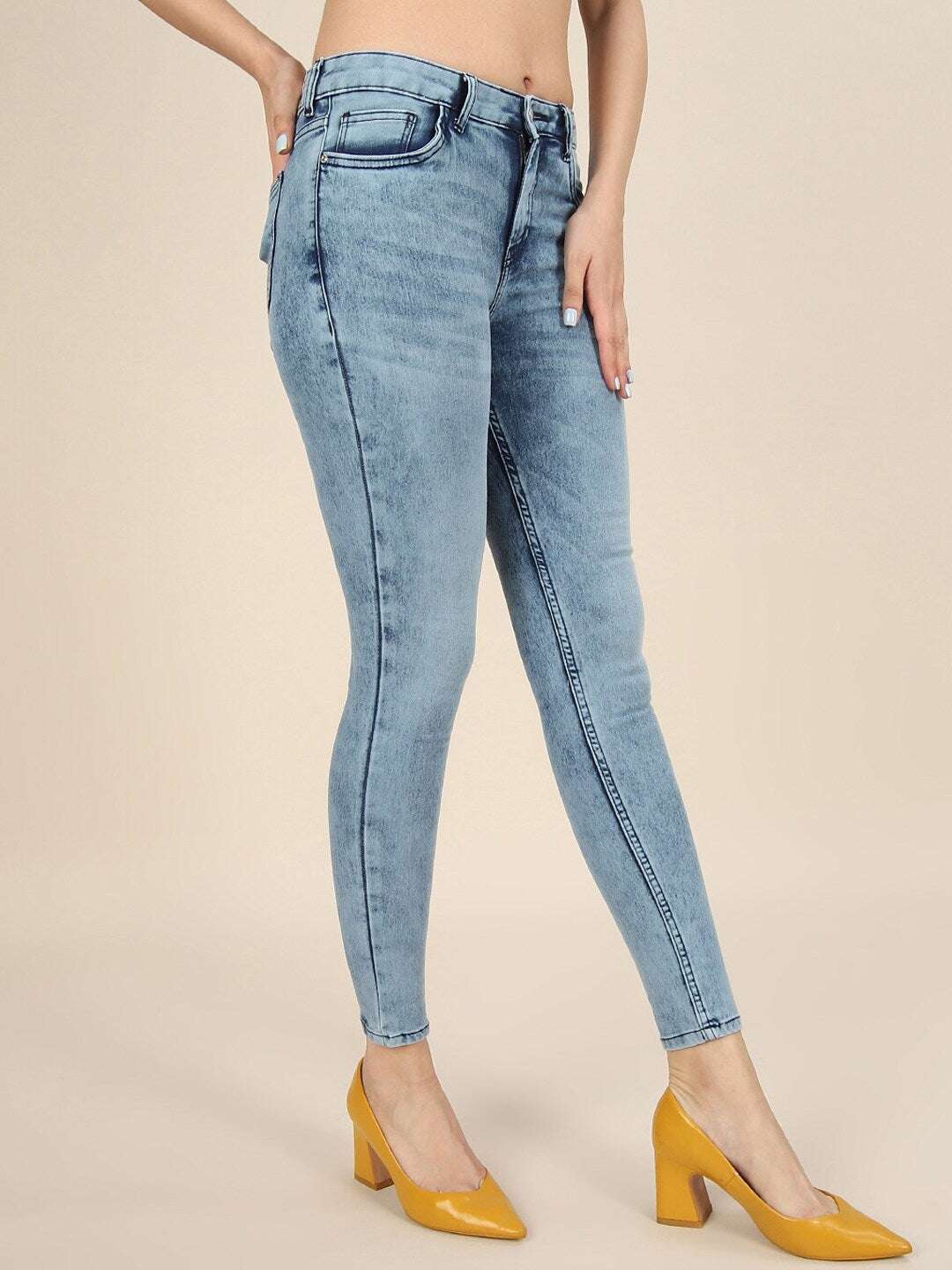 Shop Women Distressed Slim-Fit Jeans Online.