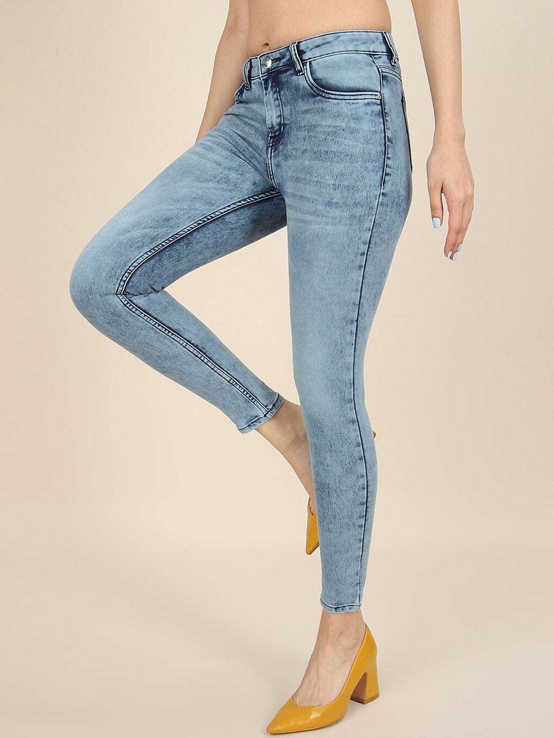 Shop Women Distressed Slim-Fit Jeans Online.