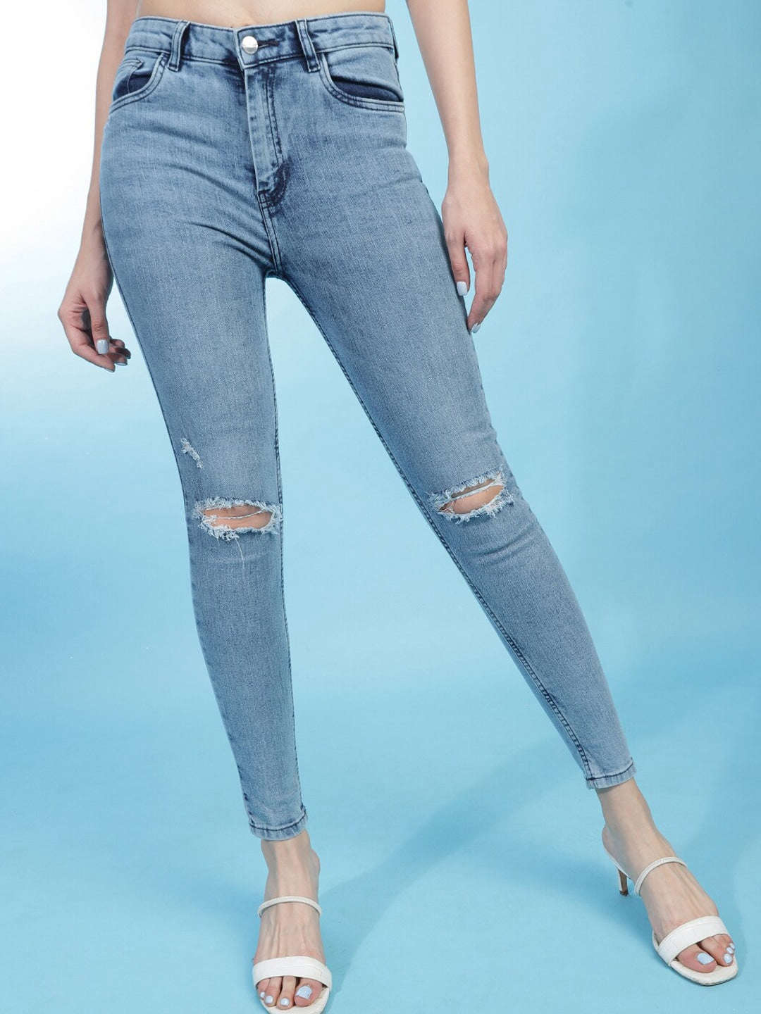 Shop Women Distressed Slim-Fit Jeans Online.