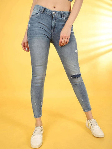 Shop Women Distressed Slim-Fit Jeans Online.