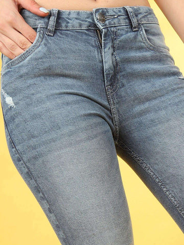 Shop Women Distressed Slim-Fit Jeans Online.