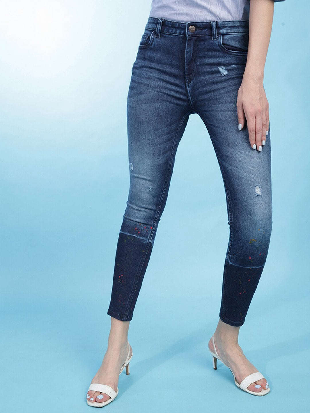 Shop Women Distressed Slim-Fit Jeans Online.