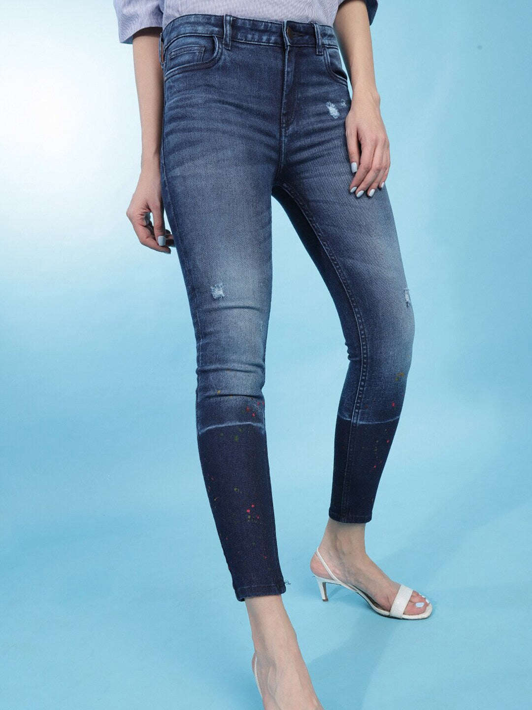 Shop Women Distressed Slim-Fit Jeans Online.