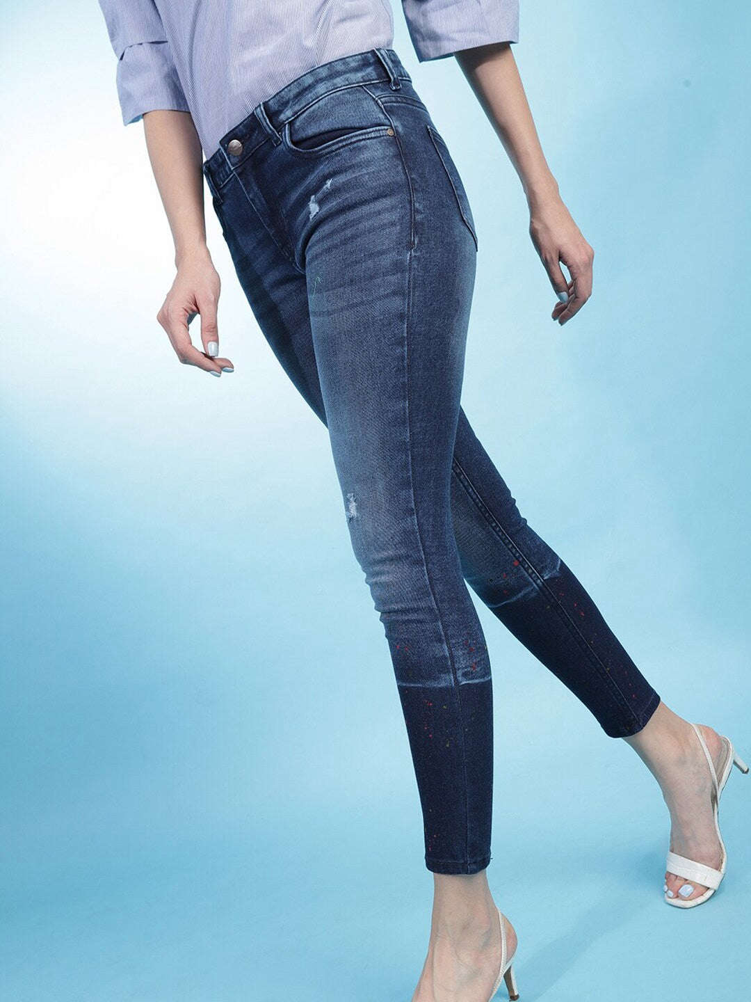 Shop Women Distressed Slim-Fit Jeans Online.