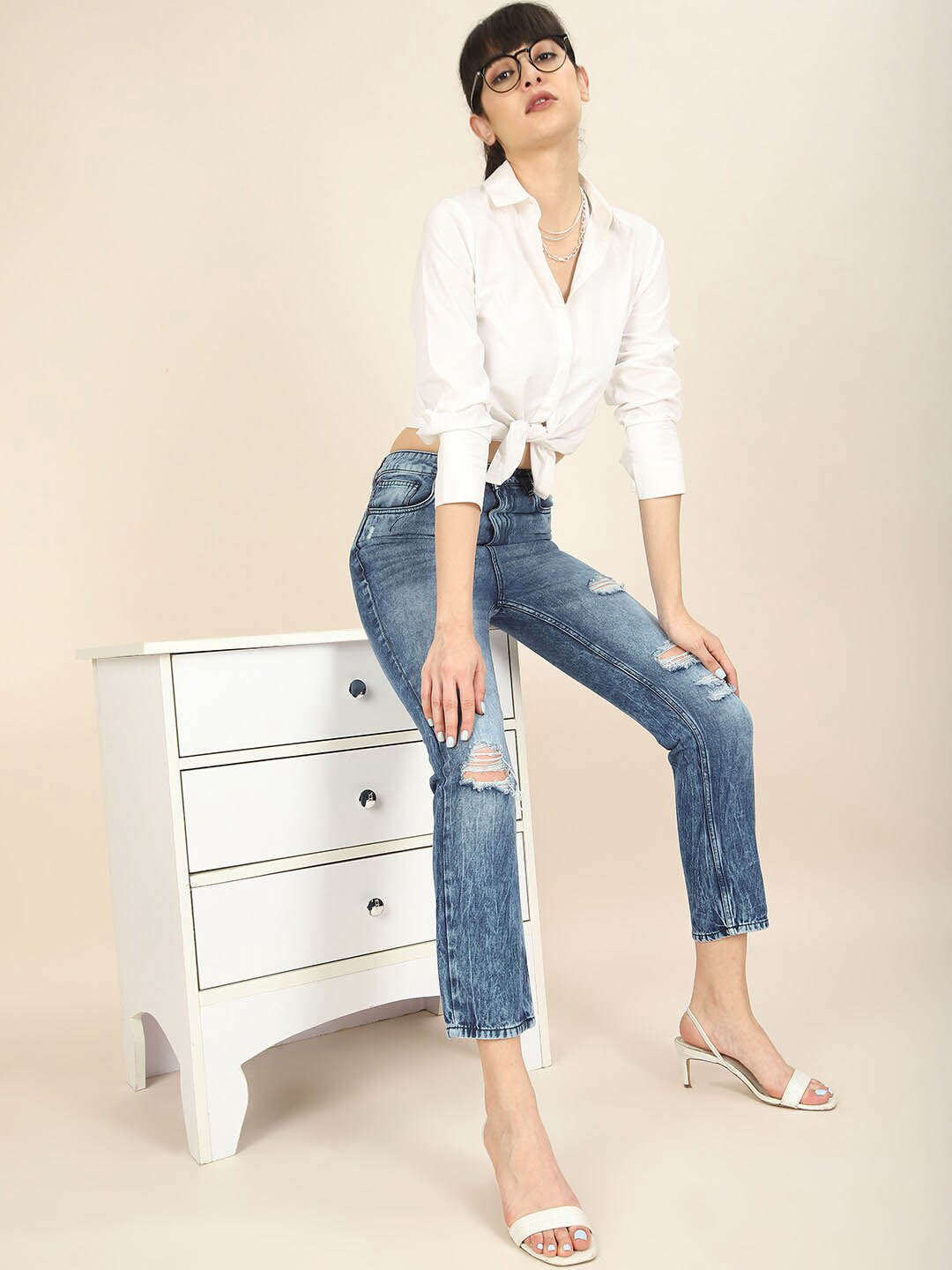 Shop Women Distress Straight Fit Jeans Online.