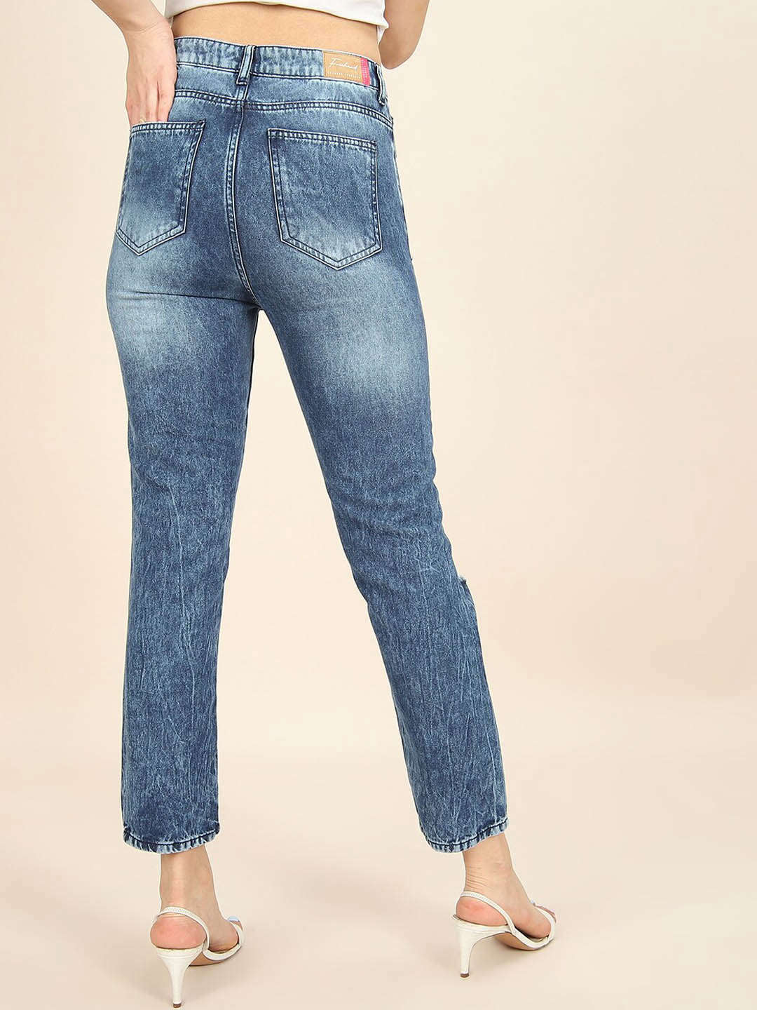 Shop Women Distress Straight Fit Jeans Online.