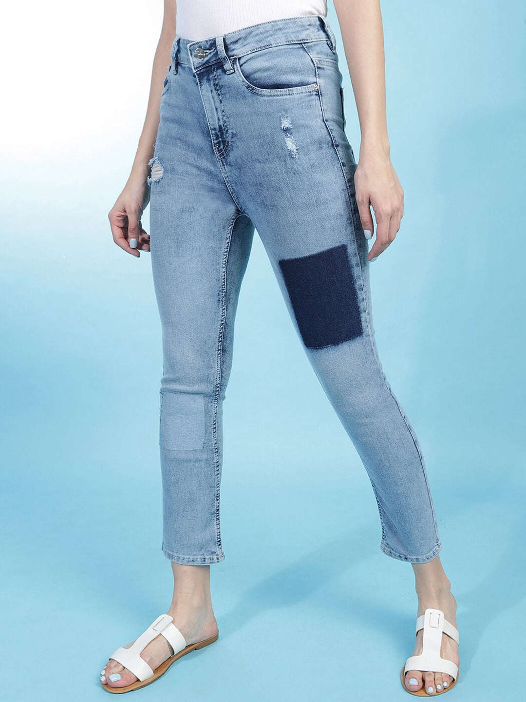 Shop Women Distress Straight Fit Jeans Online.