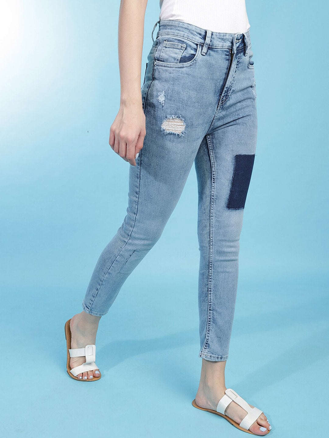 Shop Women Distress Straight Fit Jeans Online.