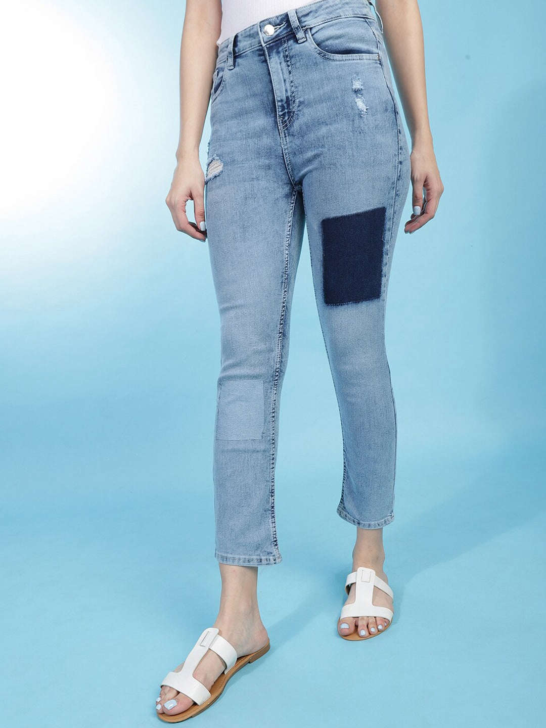 Shop Women Distress Straight Fit Jeans Online.