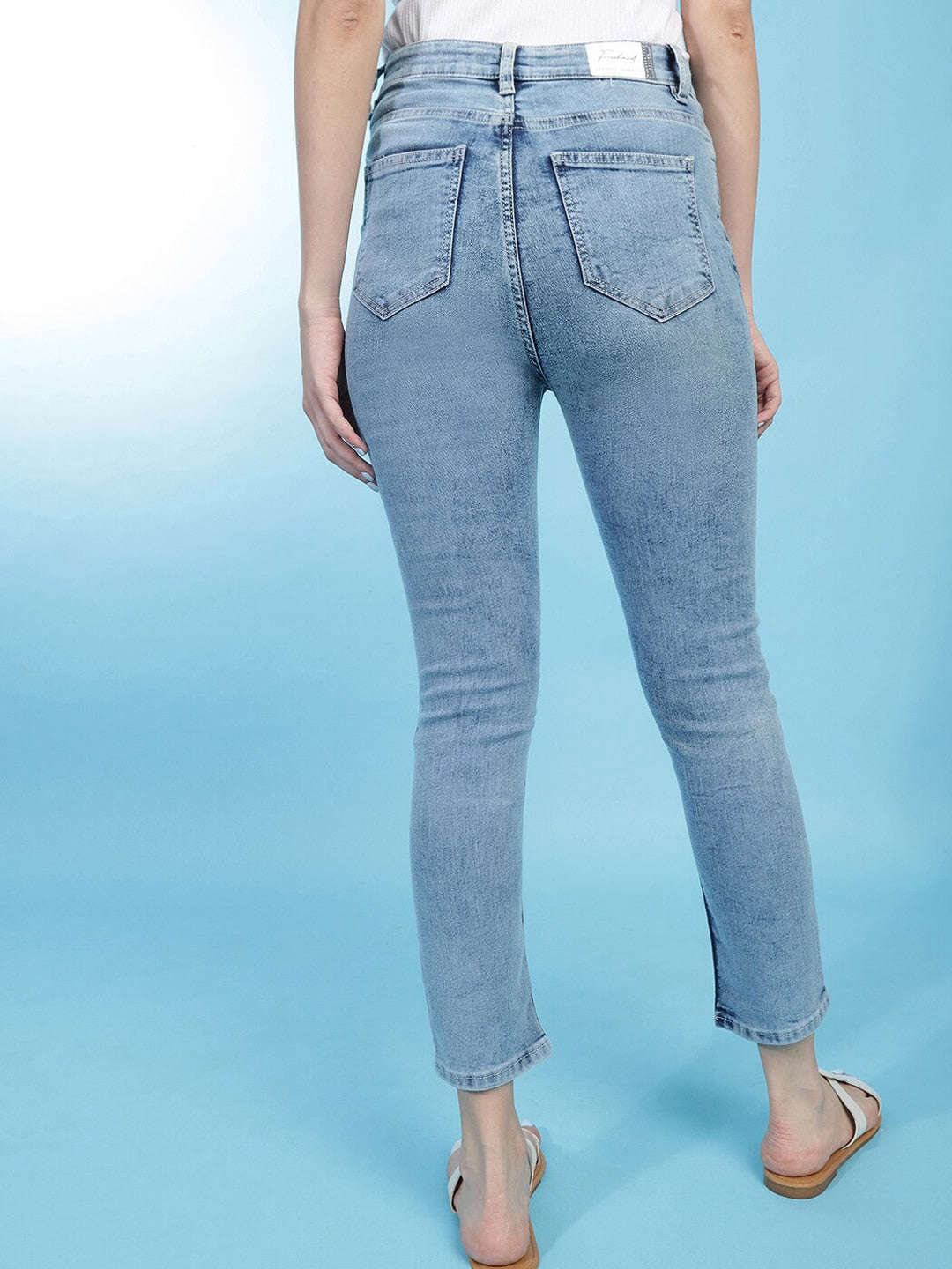 Shop Women Distress Straight Fit Jeans Online.