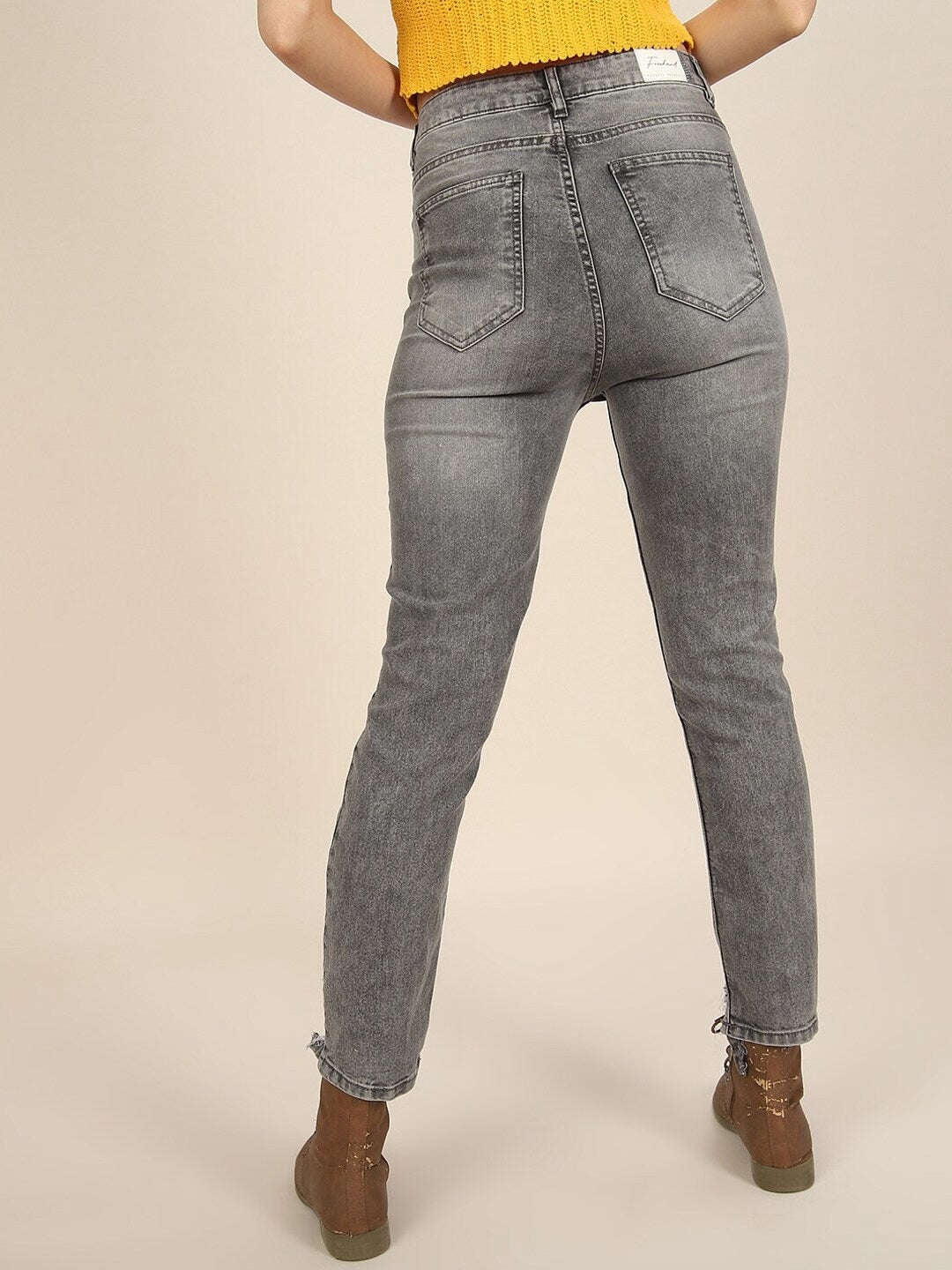 Shop Women Distress Straight Fit Jeans Online.