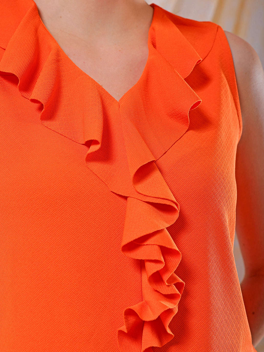 Shop Freehand Women Orange Fitted Textured Ruffled Ruffle Top Online.