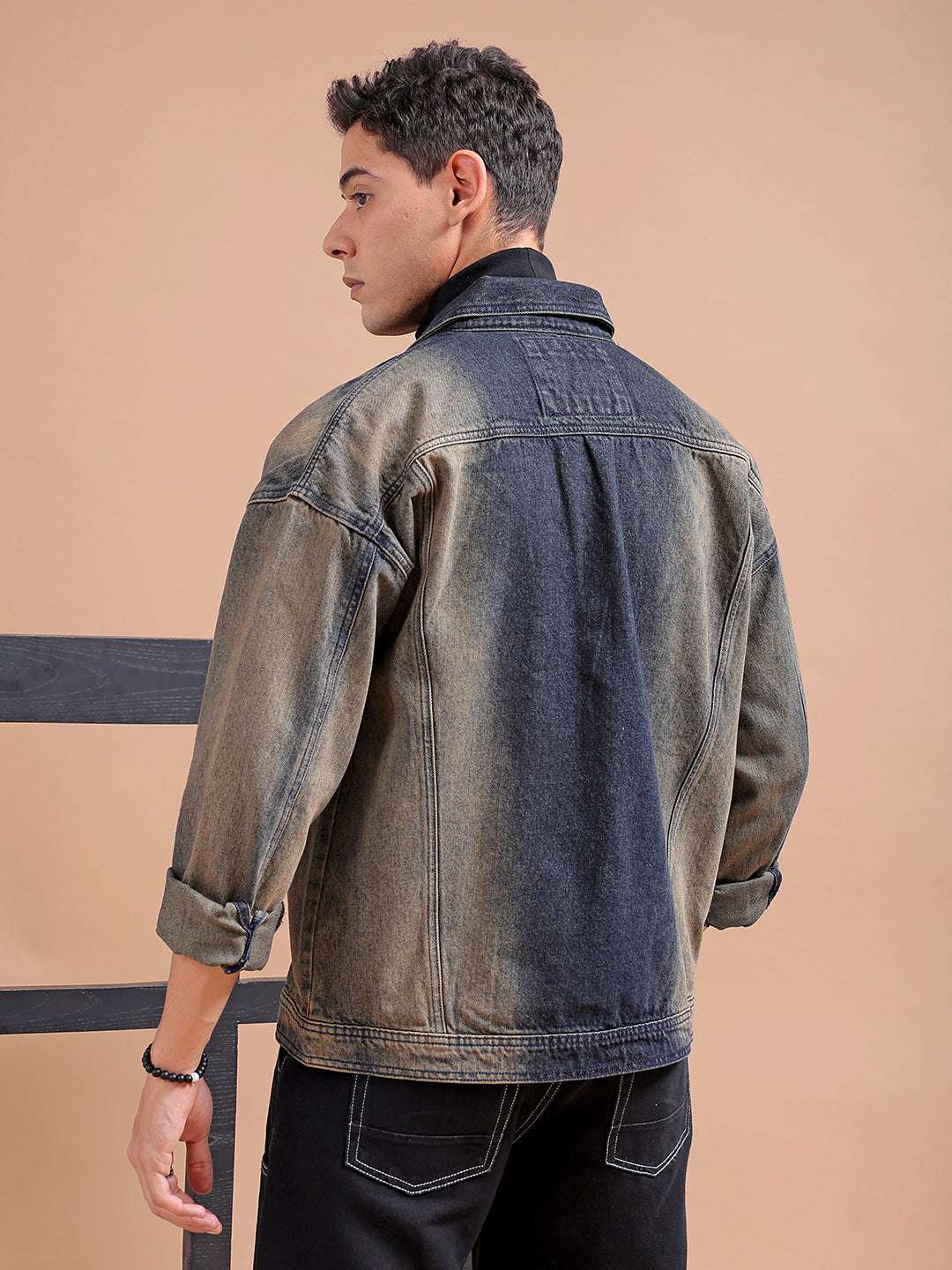 Shop Men Solid Relaxed Fit Denim Trucker Jacket Online.