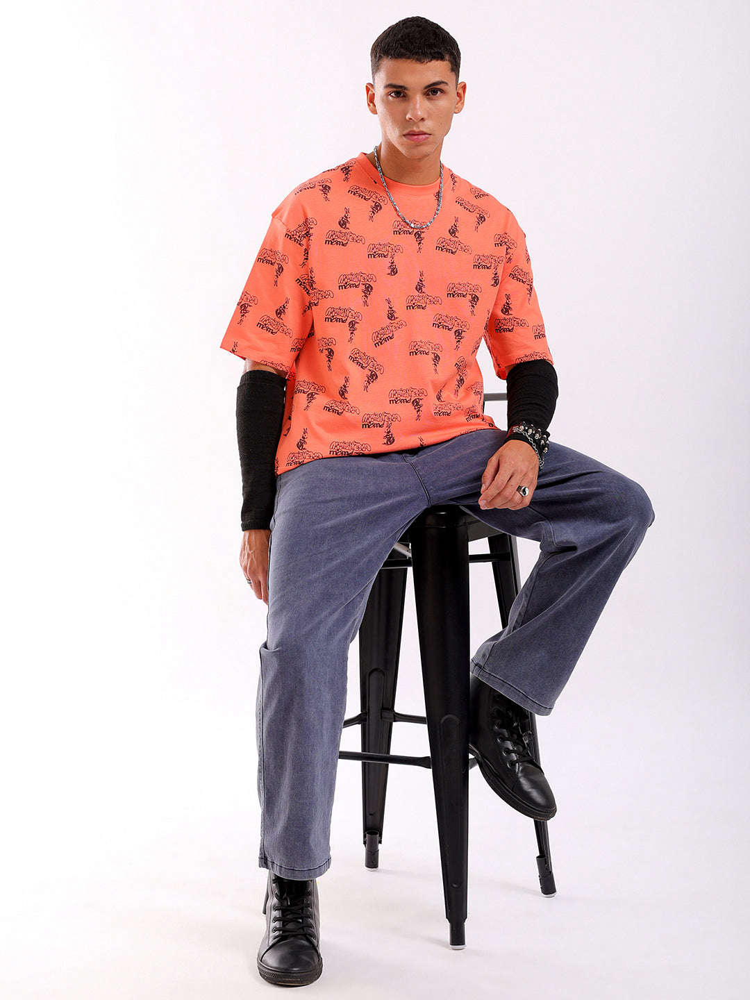 Shop Men Orange Oversized Fit Printed T-Shirt Online.