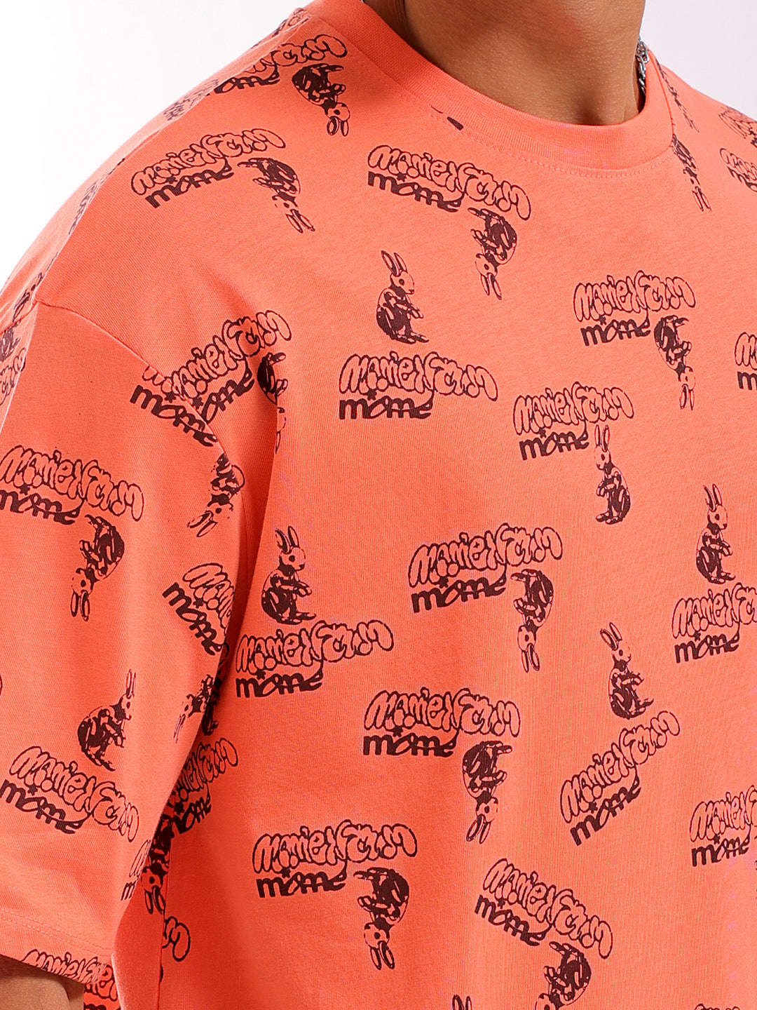 Shop Men Orange Oversized Fit Printed T-Shirt Online.