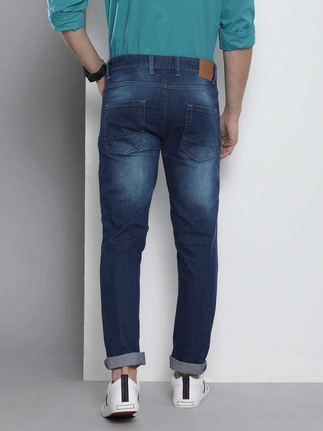 Shop Men Solid Regular Fit Jeans Online.