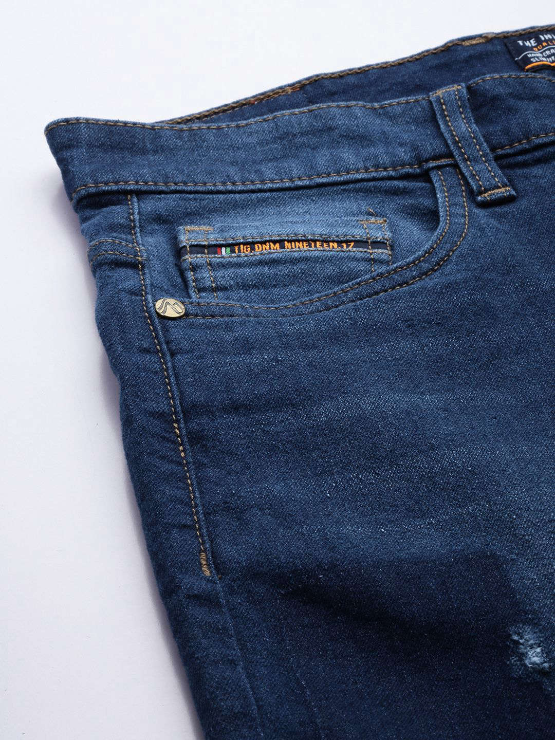 Shop Men Solid Regular Fit Jeans Online.