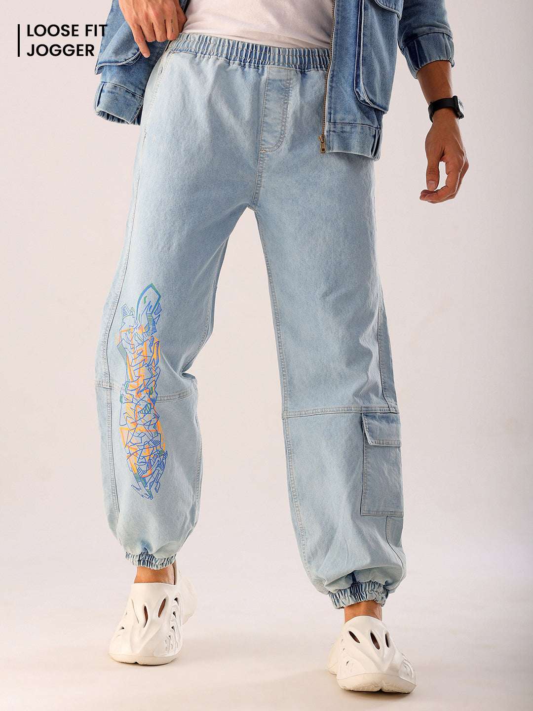 Shop Men Blue Solid Loose Fit Denim Jogger Online.