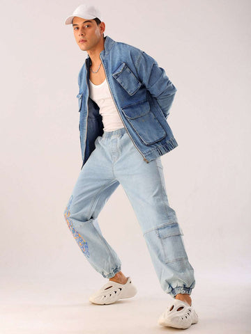 Shop Men Blue Solid Loose Fit Denim Jogger Online.