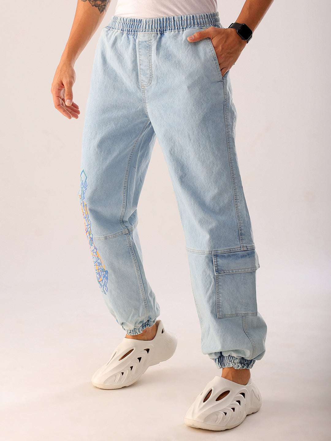 Shop Men Blue Solid Loose Fit Denim Jogger Online.