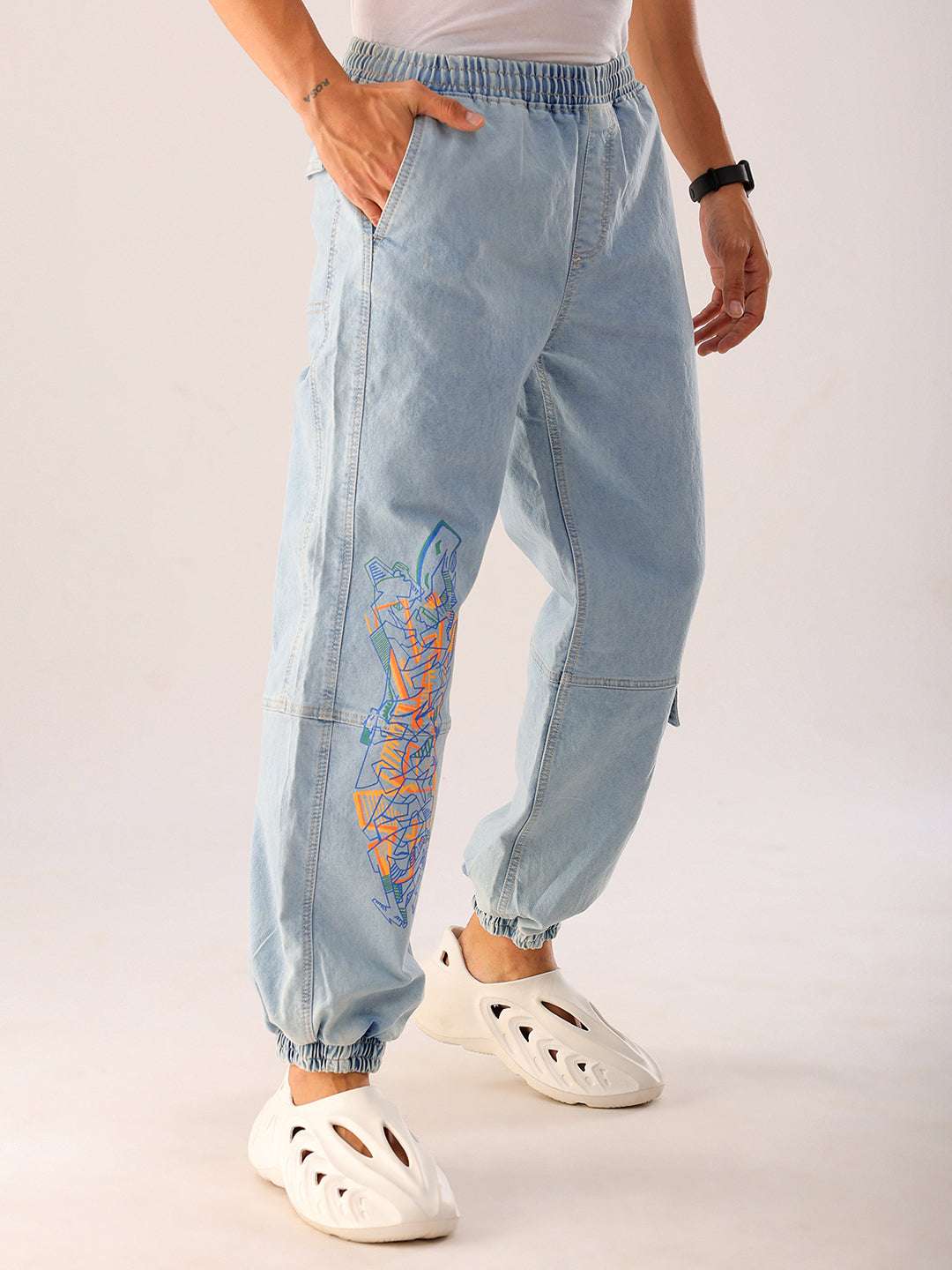 Shop Men Blue Solid Loose Fit Denim Jogger Online.