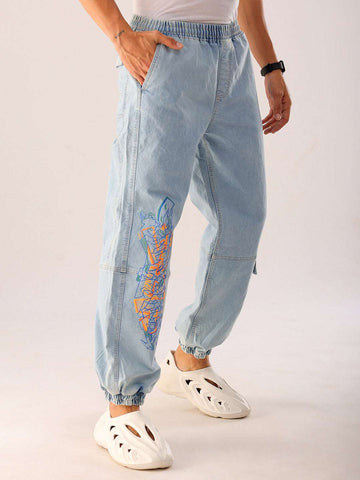 Shop Men Blue Solid Loose Fit Denim Jogger Online.