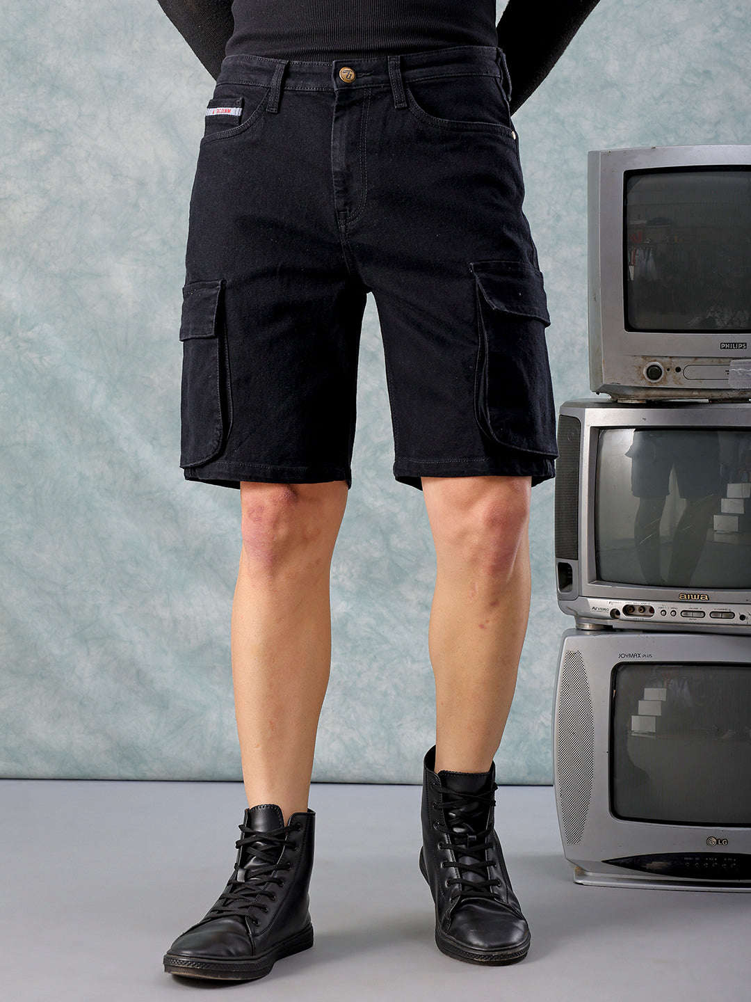 Shop Men Black Relaxed Fit Solid Denim Shorts Online.