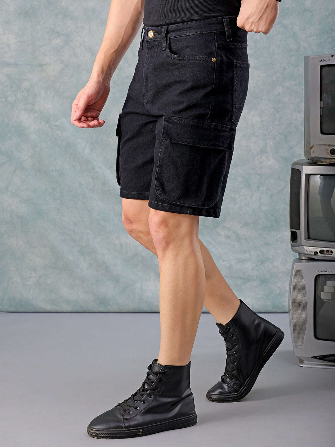 Shop Men Black Relaxed Fit Solid Denim Shorts Online.