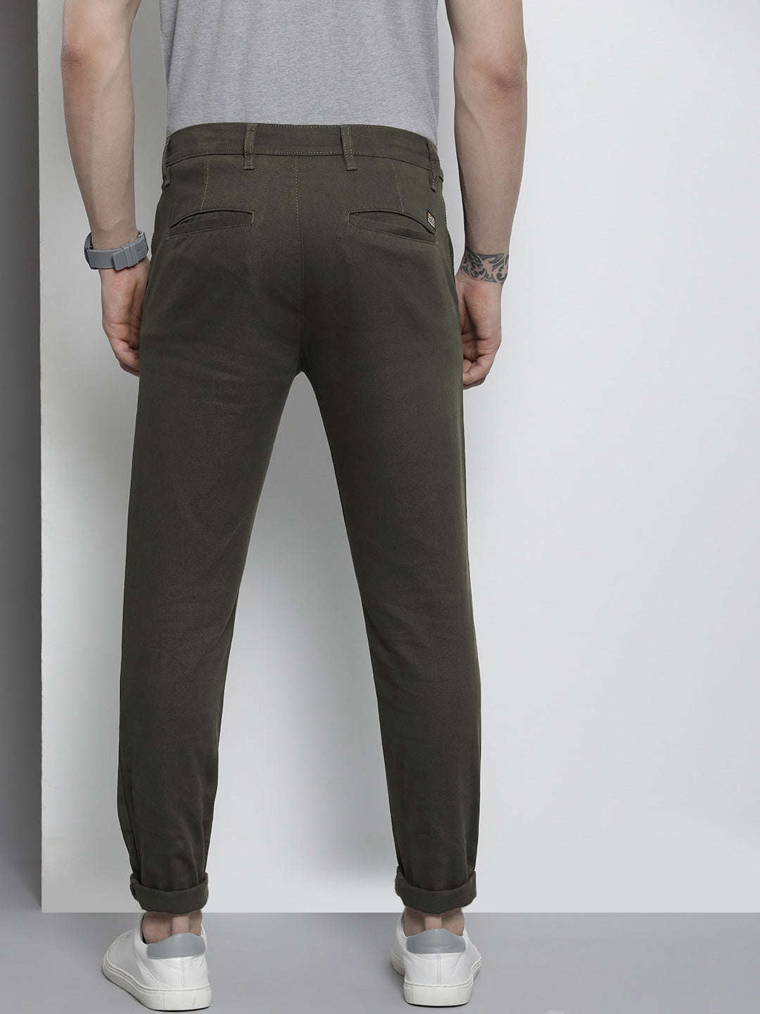 Shop Men Solid Slim Fit Chino Online.