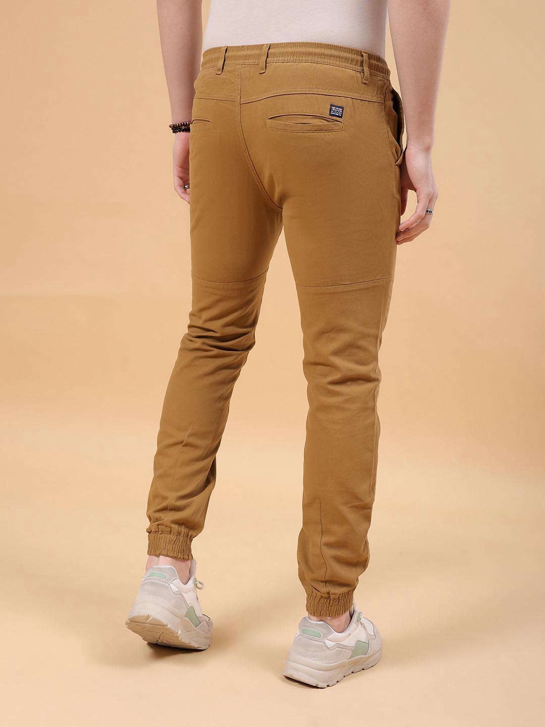 Shop Men Solid Slim Fit Jogger Online.