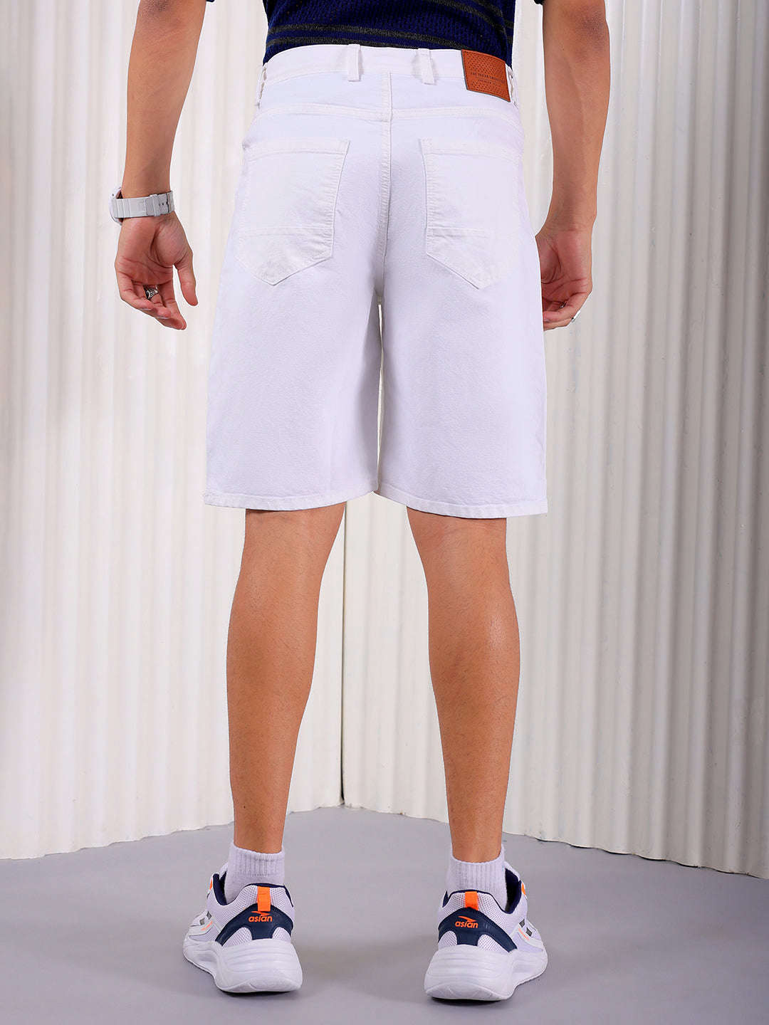 Shop Men Solid Regular Fit Shorts Online.