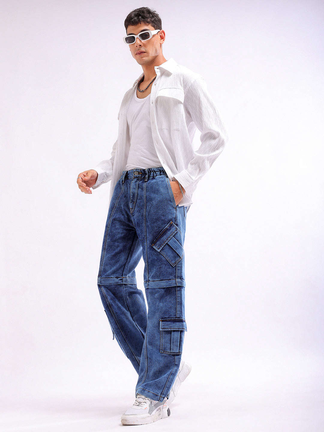 Shop Men Solid Wide Leg Zip-Off Convertible Utility Jeans Online.