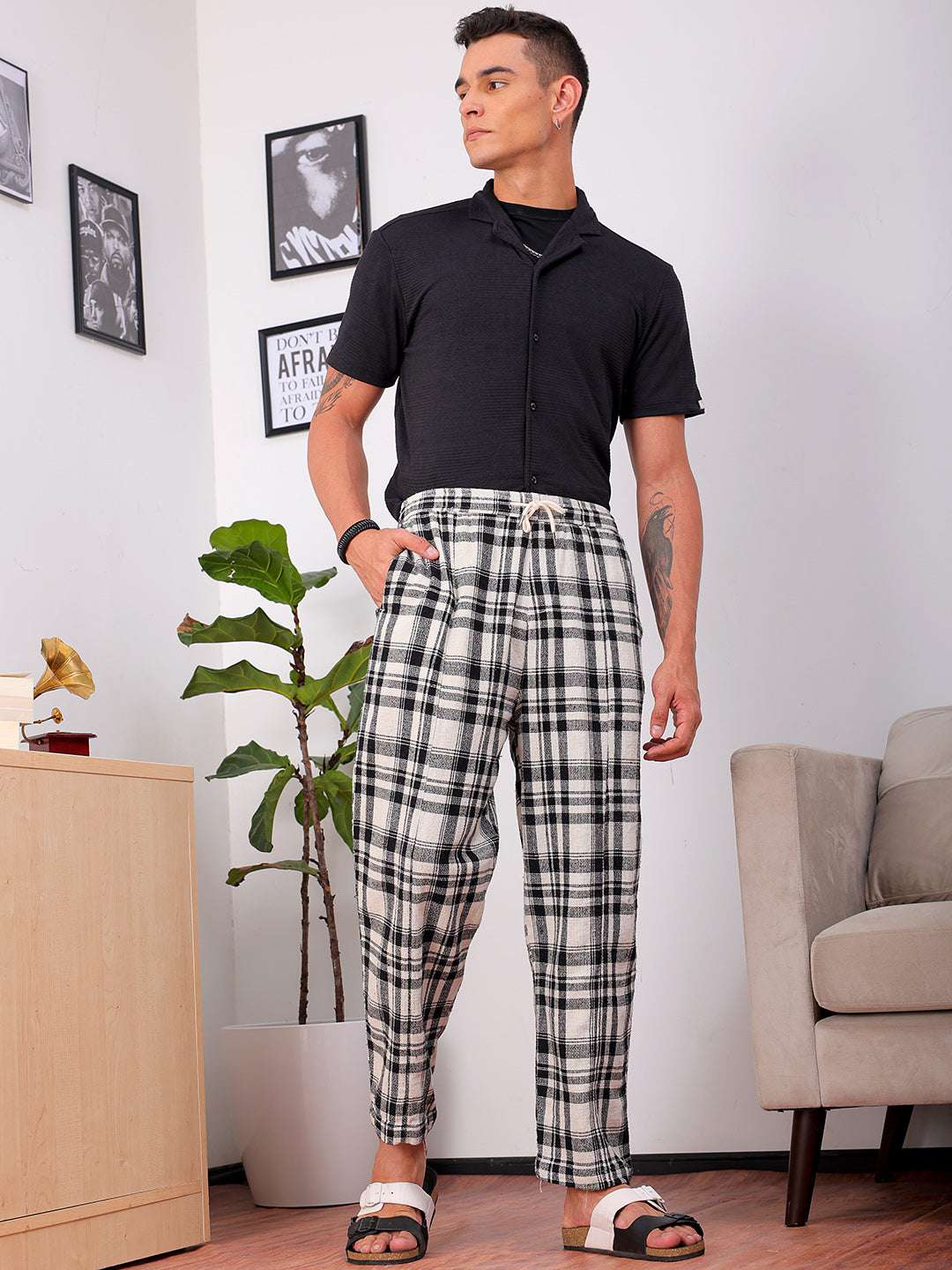 Shop Men's Black Loose Fit Striped Cotton Joggers Online.