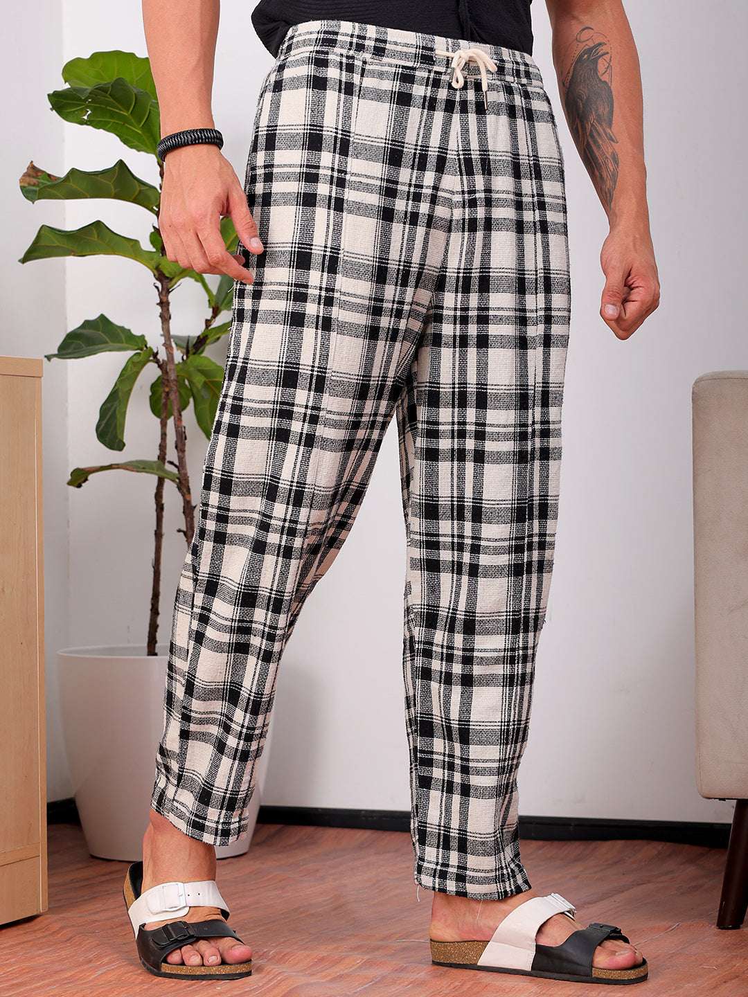 Shop Men's Black Loose Fit Striped Cotton Joggers Online.