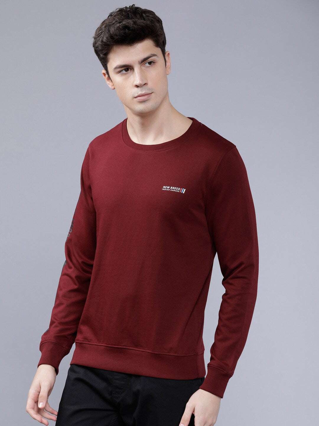 Shop Men's Solid Slim Fit Sweatshirt Online.