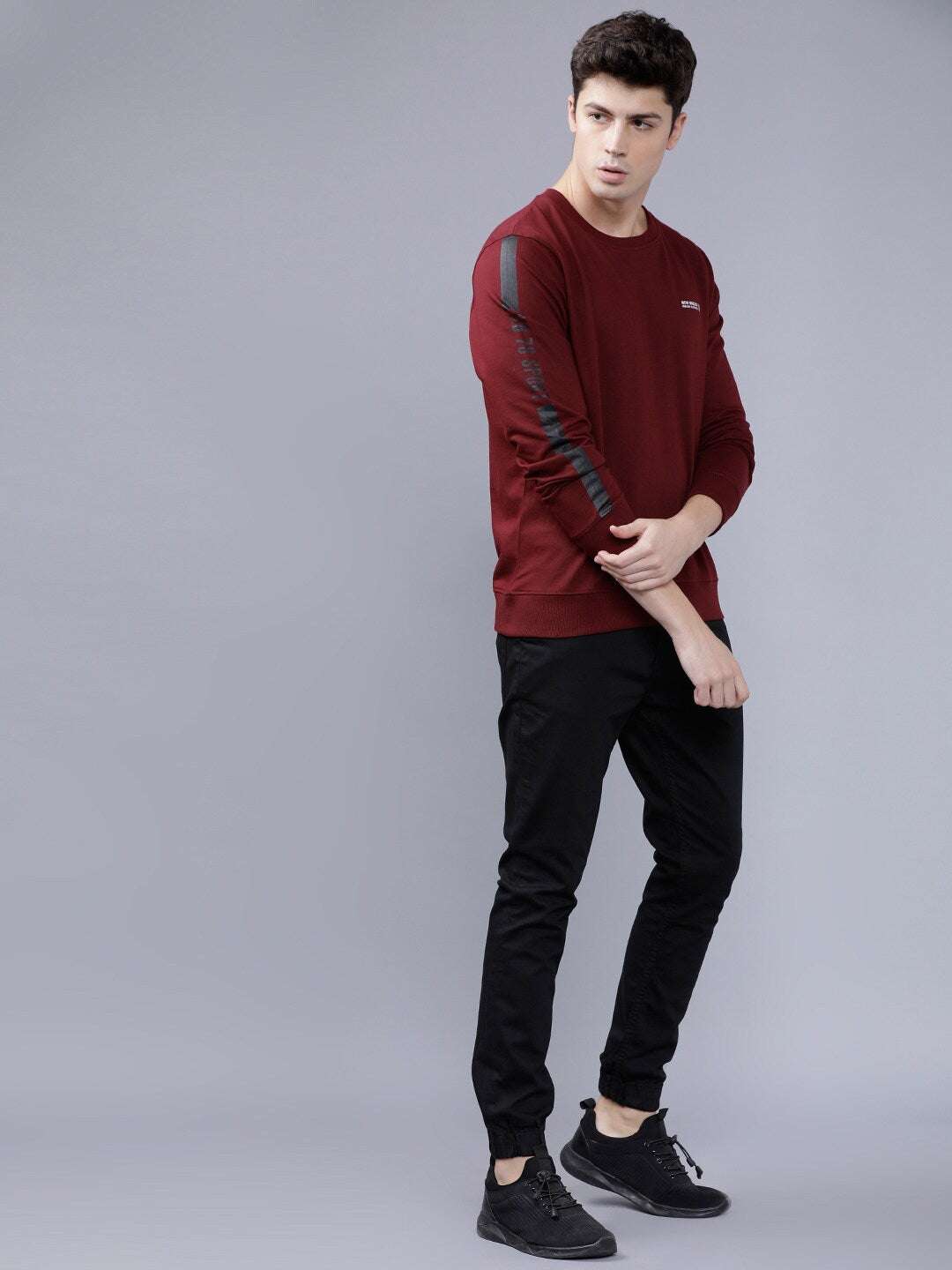 Shop Men's Solid Slim Fit Sweatshirt Online.