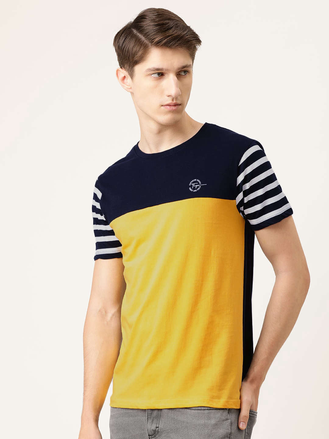 Shop Men Colourblocked TShirt Online.