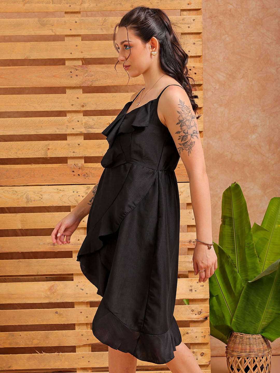 Shop Women's Black Fit and Flare Solid Partywear Asymmetric Dress Online.